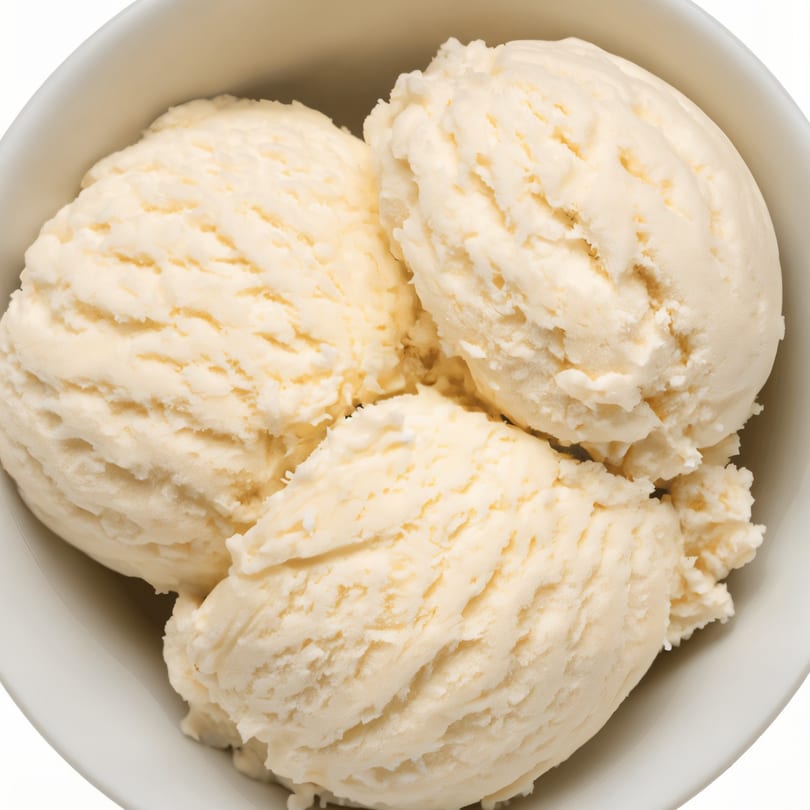 Three scoops of vanilla ice cream in a white bowl, a sweet treat from CHICAGOland Hotdogs & More.